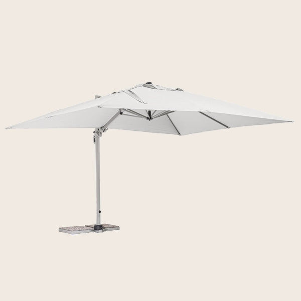 Andrea Bizzotto Saragozza ombrellone 3x4 grigio in in alluminio e strutturato ambientato in spazio living con arredi...