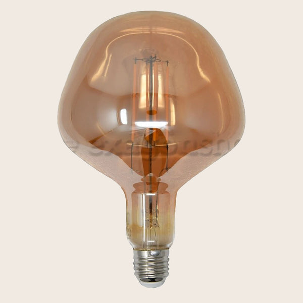 Lampadina ambra Vintage E27 luce calda 305 lumen accesa in ambiente, design e diffusione della luce - Exagonshop