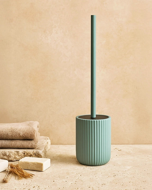 Portascopino wc a pavimento in ceramica verde color in naturale montato a parete, vista del design e della finitura...