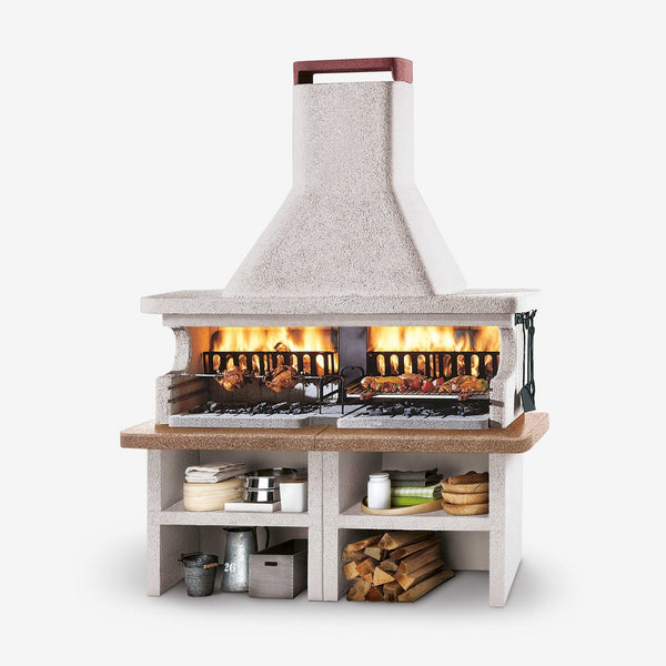 Palazzetti Miami 3 barbecue a legna grezzo doppio grill e accesa in soggiorno, fiamma visibile attraverso il vetro