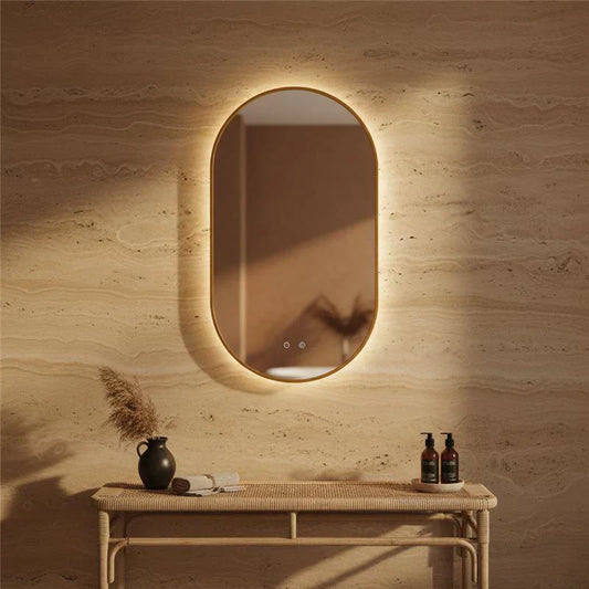 Arredo bagno contemporaneo: materiali autentici, forme scultoree e benessere quotidiano