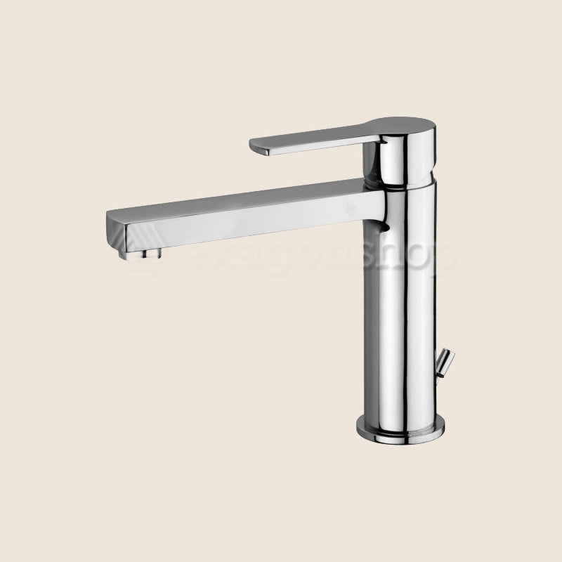 Paffoni West Ws073 Miscelatore lavabo con Scarico Cromo in lucido ambientato su piano bagno con accessori