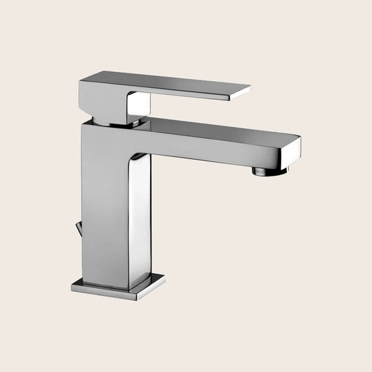 Paffoni Elle El071 Miscelatore Lavabo Senza Scarico Cromo ambientato su piano bagno con accessori