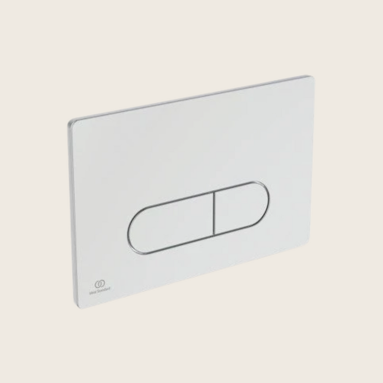 Placca comando meccanico per cassette Prosys cromo lucido ambientato su piano bagno con accessori
