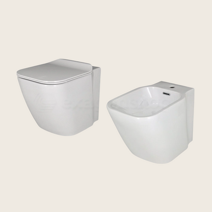 Coppia sanitari filo muro a pavimento bidet e vaso con sedile rallentato bianco lucido Porcelanosa Noken Essence C