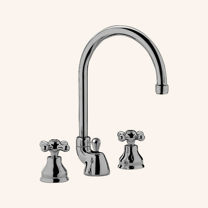Paffoni Iris Irv057 Gruppo Lavabo 3 Fori Con Scarico ambientato su piano bagno con accessori