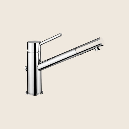 Paffoni Birillo Bi085 Miscelatore lavabo prolungato Scarico ambientato su piano bagno con accessori