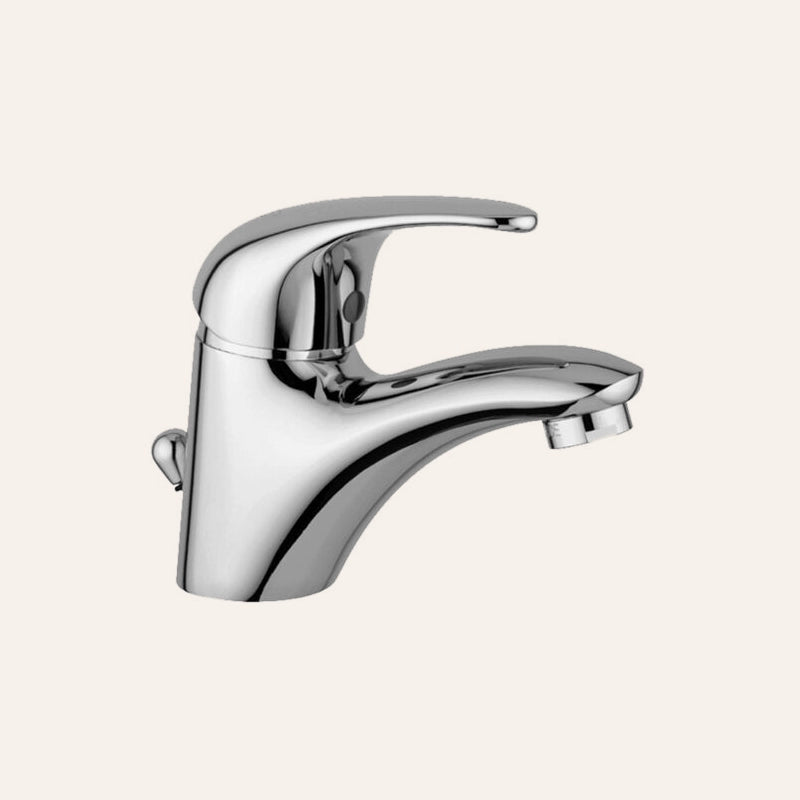 Paffoni Nettuno Due Nd075 Miscelatore lavabo scarico ambientato su piano bagno con accessori