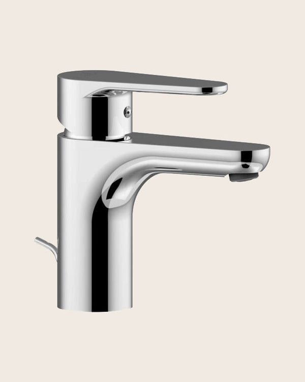 Paffoni Green Gr075 Es Miscelatore Monocomando Lavabo Cromo in lucido ambientato su piano bagno con accessori