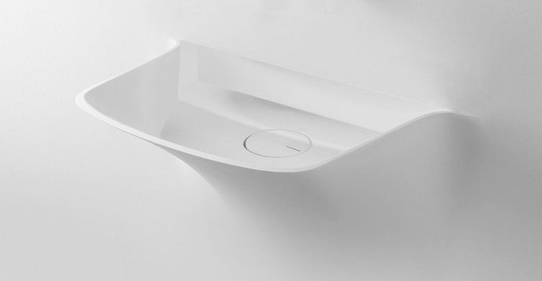 Antonio Lupi Design Soffio Lavavo Da Incasso Parete In in corian ambientato su piano bagno con accessori
