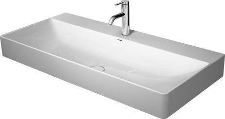 Lavabo 100x47 Rettificato da appoggio monoforo senza in ceramica ambientato su piano bagno con accessori