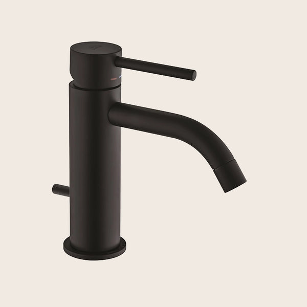 Paffoni Light Lig075no Miscelatore Lavabo Con Sistema Di in opaco ambientato su piano bagno con accessori