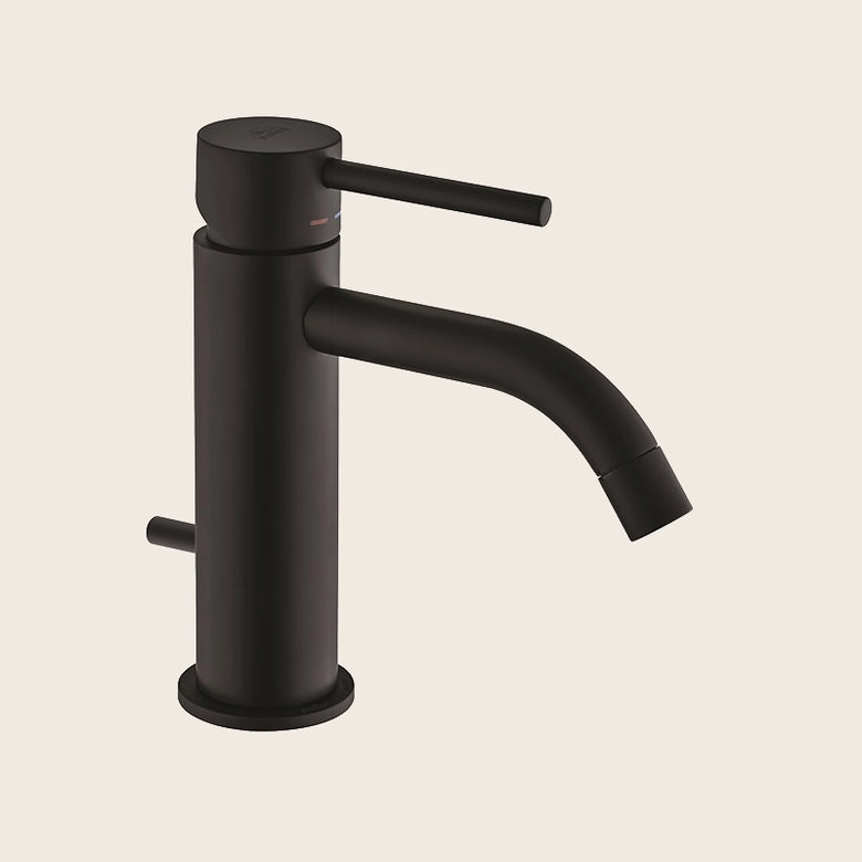 Paffoni Light Lig075no Miscelatore Lavabo Con Sistema Di in opaco ambientato su piano bagno con accessori