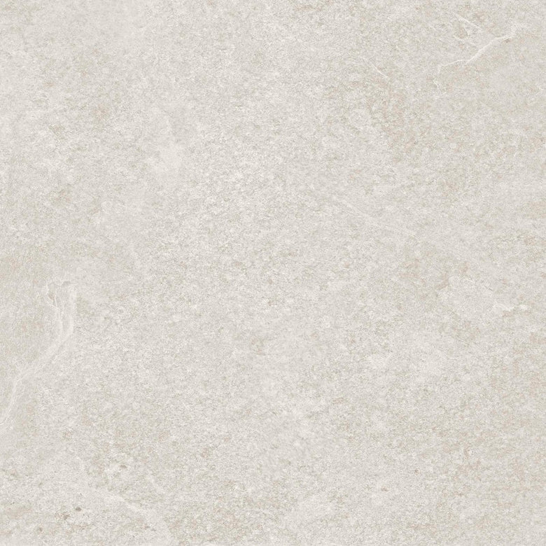Pavimento rivestimento 60x60 effetto pietra rettificato in posata in ambiente arredato, dettaglio della venatura