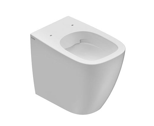 Ceramica Globo Genesis Vaso Senza Brida in ceramica Bianco in lucido ambientato su piano bagno con accessori