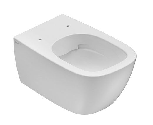 Globo Genesis Vaso Sospeso Senza Brida senza sedile in in ceramica e lucido ambientato su piano bagno con accessori...