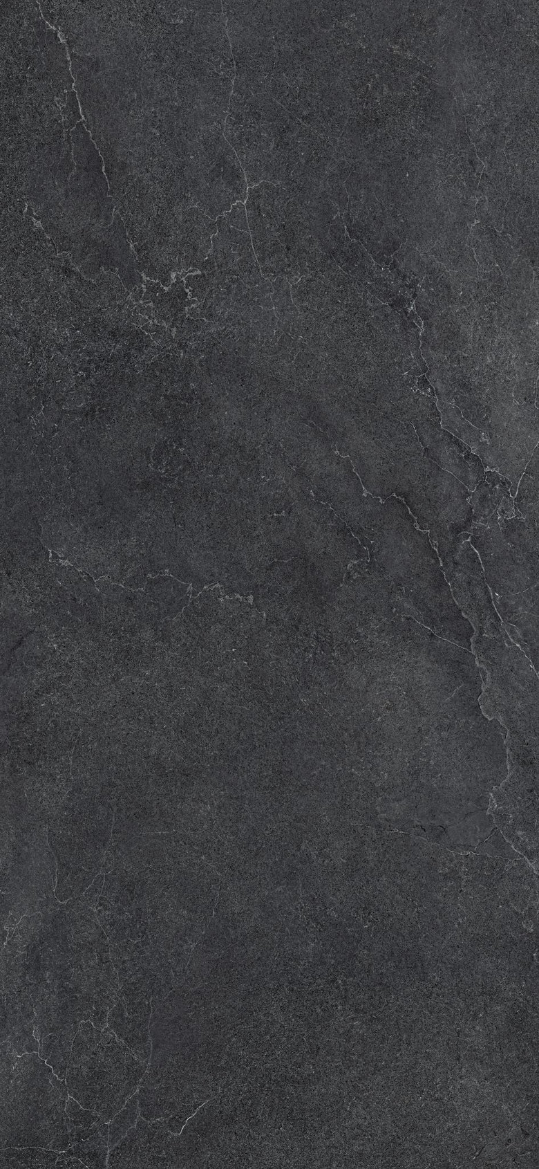 Cotto D'Este Kerlite Lithos 6plus Pavimento Rivestimento Carbon Lt posata in ambiente arredato, dettaglio della venatura...