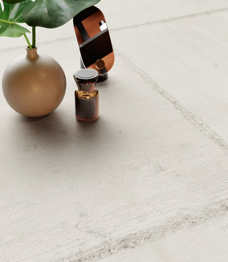 Pavimento Rivestimento 60x180 effetto cemento Light posata in ambiente arredato, dettaglio della venatura