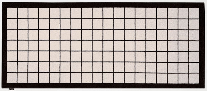 Antonio Lupi Tramato Tappeto 200x85 In Velluto TR441 Nero ambientato in spazio living con arredi coordinati - Antonio...