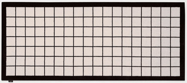 Antonio Lupi Tramato Tappeto 200x85 In Velluto TR441 Nero ambientato in spazio living con arredi coordinati - Antonio...