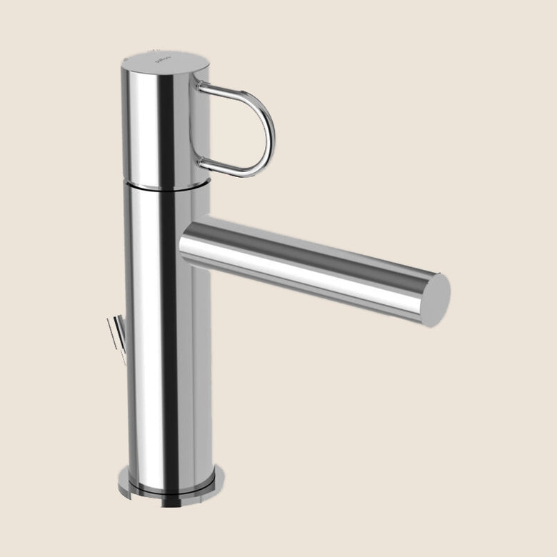 Paffoni Joker Jk075k Miscelatore Lavabo Con Scarico in lucido ambientato su piano bagno con accessori