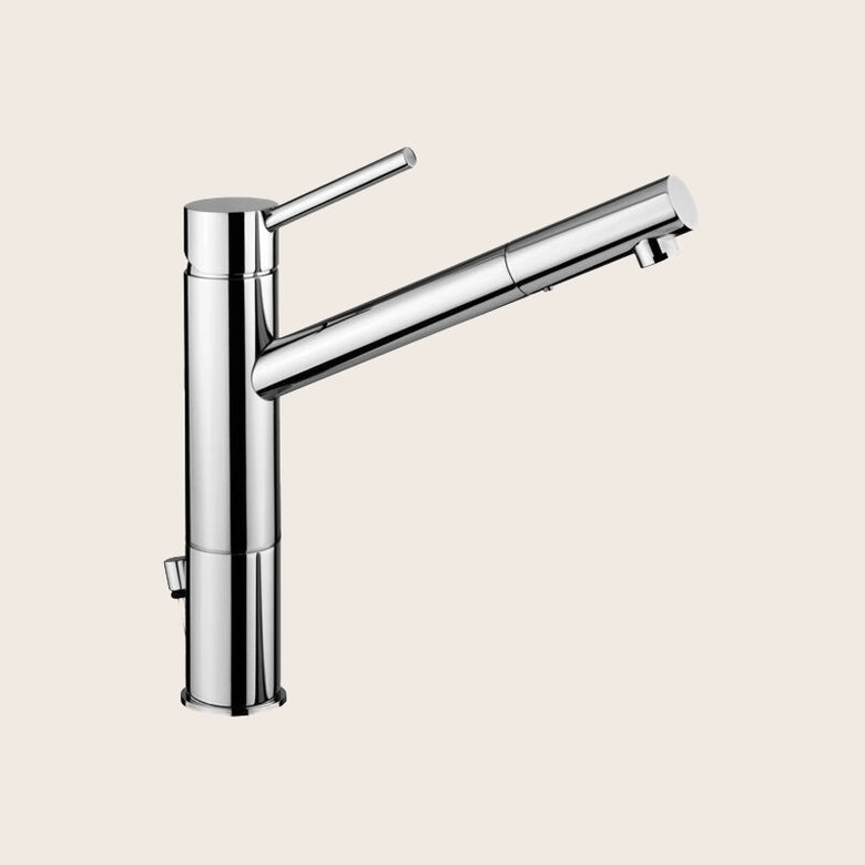 Paffoni Birillo Miscelatore lavabo canna lunga con prolunga in lucido ambientato su piano bagno con accessori