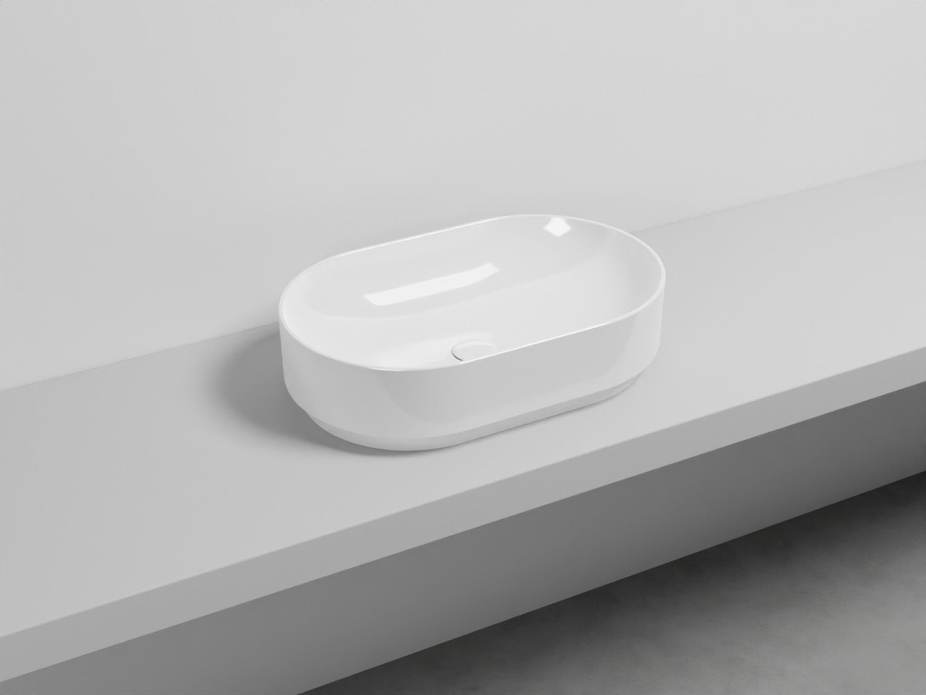 Cielo Mare lavabo 60x38 da appoggio senza troppopieno in 00 BIANCO in ceramica e lucido ambientato su piano bagno con...