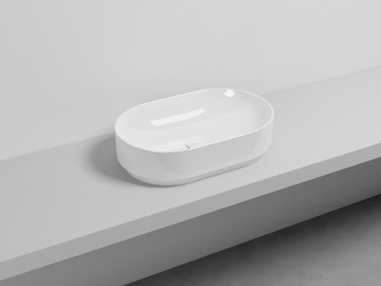 Cielo Mare lavabo 60x38 da appoggio senza troppopieno in 00 BIANCO in ceramica e lucido ambientato su piano bagno con...