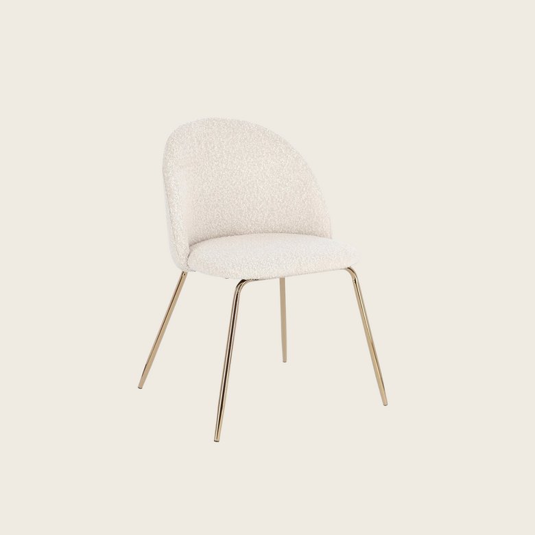 Andrea Bizzotto Tanya sedia effetto boucle avorio gambe oro ambientato in spazio living con arredi coordinati