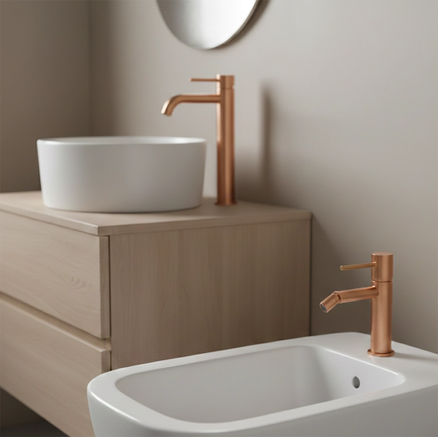 Coppia rubinetti lavabo alto e bidet senza scarico oro rosa spazzolato Memo