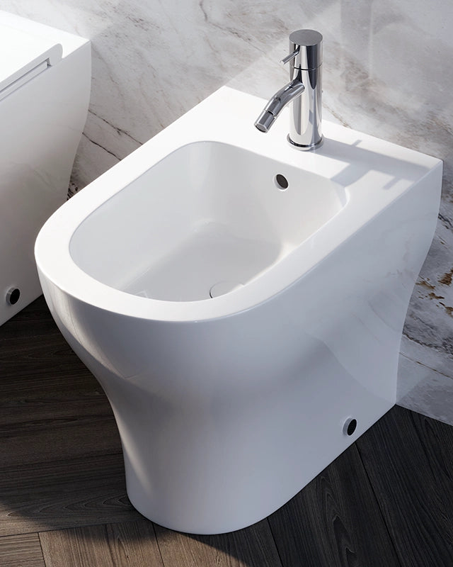 Coppia sanitari Touch a pavimento filo muro bianco lucido visto dall'alto con scarico e interno visibili - Exagonshop