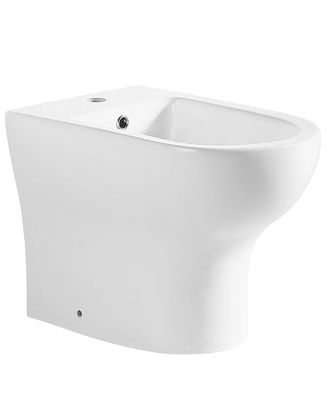 Coppia sanitari Touch a pavimento filo muro bianco lucido ambientato su piano bagno con accessori - Exagonshop