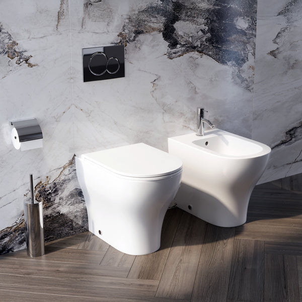 Coppia sanitari Touch a pavimento filo muro bianco lucido con sedile softclose