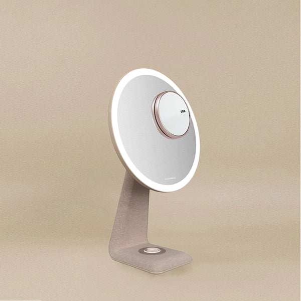Cosmic Essential specchio illuminato da appoggio blossom con lavabo e rubinetteria, vista frontale su sfondo neutro...