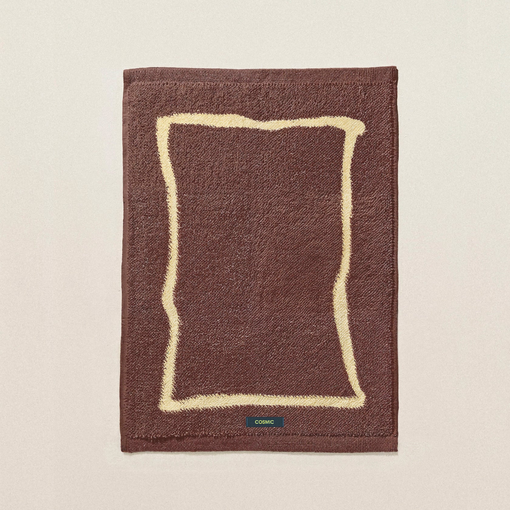 Cosmic Frames Tappeto 50x70 da bagno antiscivolo toffee montato a parete, vista del design e della finitura - Industrias...