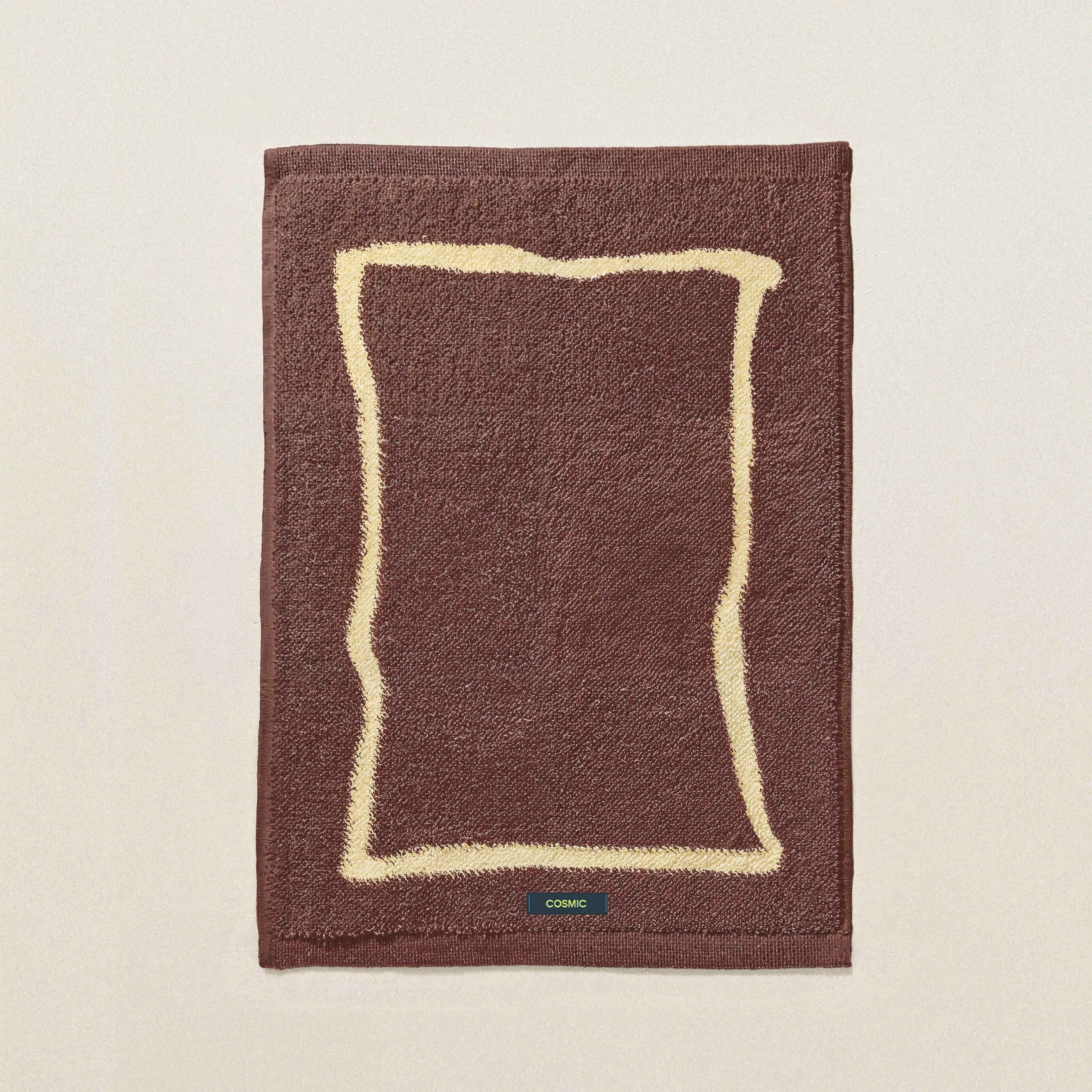Cosmic Frames Tappeto 50x70 da bagno antiscivolo toffee montato a parete, vista del design e della finitura - Industrias...