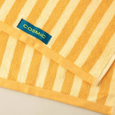 Cosmic Stripes Asciugamano 30x50 honey yellow, vista laterale del profilo a muro - Industrias Cosmic
