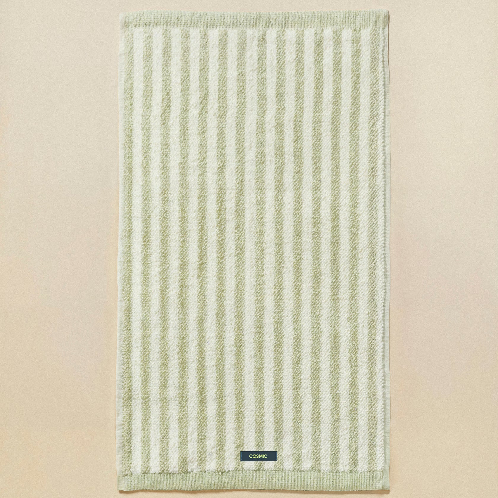 Cosmic Stripes Asciugamano da bagno 50x90 aqua mint in naturale montato a parete, vista del design e della finitura...