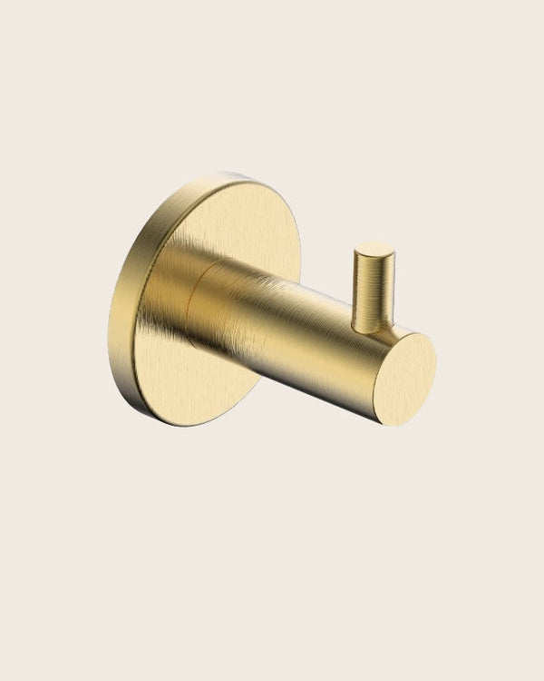 Gancio appendi asciugamano oro spazzolato Minimal in naturale montato a parete, vista del design e della finitura...