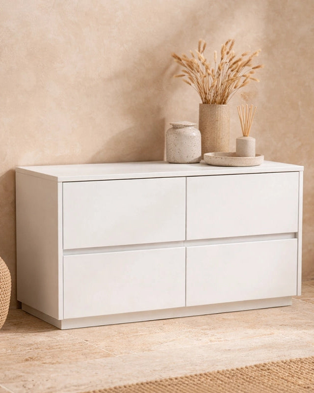 Idea Nyu mobile 90x36 a pavimento due ante bianco opaco in resina ambientato in spazio living con arredi coordinati...
