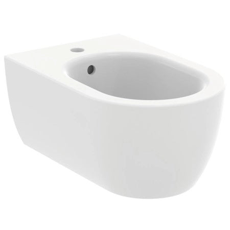 Indeal Standard Blend Curve bidet sospeso bianco lucido ambientato su piano bagno con accessori - Ideal Standard