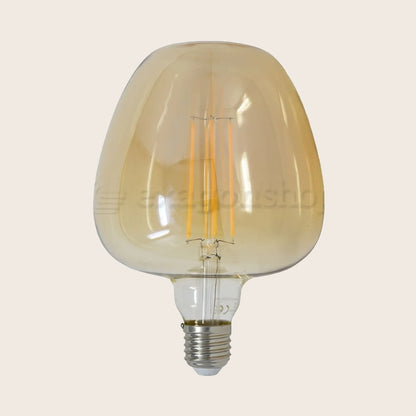 Lampadina amber Vintage E27 luce calda 820 lumen 2700k Giallo accesa in ambiente, design e diffusione della luce - Exagonshop