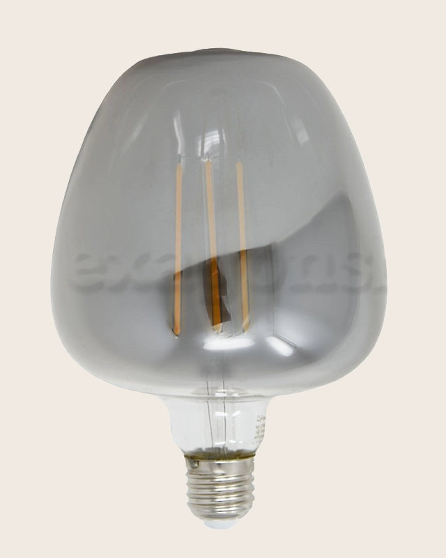 Lampadina smoky Vintage E27 luce calda 360 lumen 2700k accesa in ambiente, design e diffusione della luce - Exagonshop
