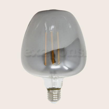 Lampadina smoky Vintage E27 luce calda 360 lumen 2700k accesa in ambiente, design e diffusione della luce - Exagonshop