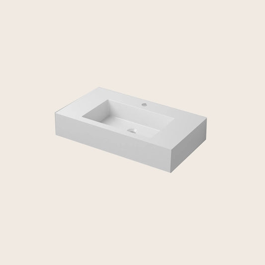 Lavabo 80x46 sospeso in resina bianco lucido in naturale ambientato su piano bagno con accessori - Exagonshop