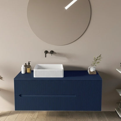 Mobile bagno 120x46 Urbino cannettato petrolio con anta e ambientato in bagno moderno con specchio e accessori - Exagonshop