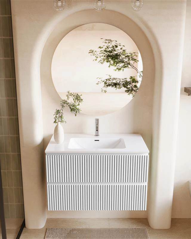 Mobile bagno 100x46 bianco opaco cannettato lavabo ceramica in lucido con lavabo e rubinetteria, vista frontale su sfondo...