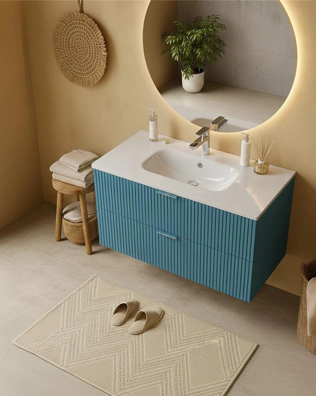 Mobile bagno 82x47 azzurro opaco cannettato Teramo con ambientato in bagno moderno con specchio e accessori - Exagonshop