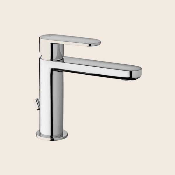 Paffoni Candy Ca071hk Miscelatore lavabo con Scarico Clic ambientato su piano bagno con accessori