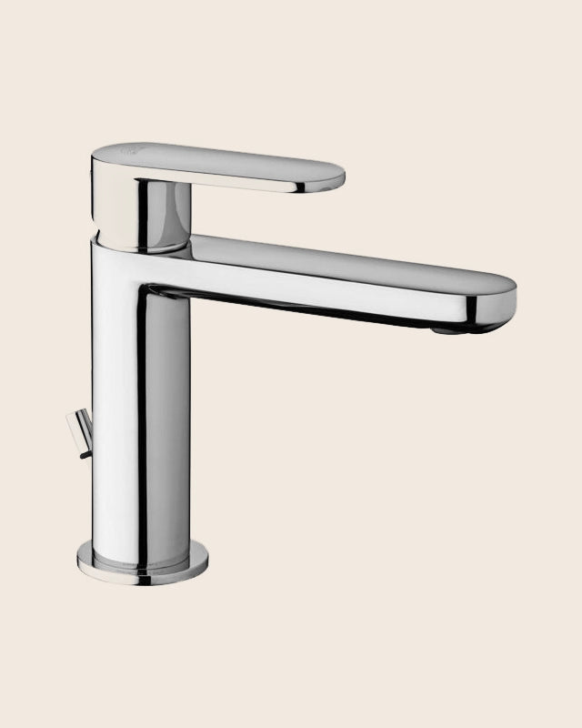 Paffoni Candy Ca071hk Miscelatore lavabo con Scarico Clic ambientato su piano bagno con accessori